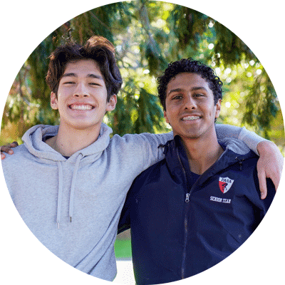 Two high school students pose for the photo